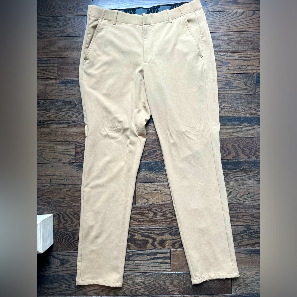 Nike dry fit golf pants. 34x34. Tan. Used in good shape.